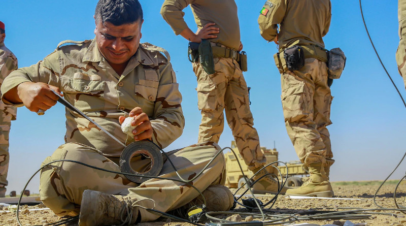 An Iraqi security forces soldier prepares an explosive device during breach training at the Besmaya Range Complex, Iraq, June 3, 2017. Photo Credit: Army Spc. William Gibson