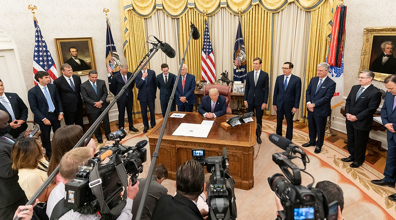 President Donald J. Trump, joined by White House senior staff members, delivers a statement announcing the agreement of full normalization of relations between Israel and the United Arab Emirates Thursday, Aug. 13, 2020, in the Oval Office of the White House. (Official White House Photo by Joyce N. Boghosian)