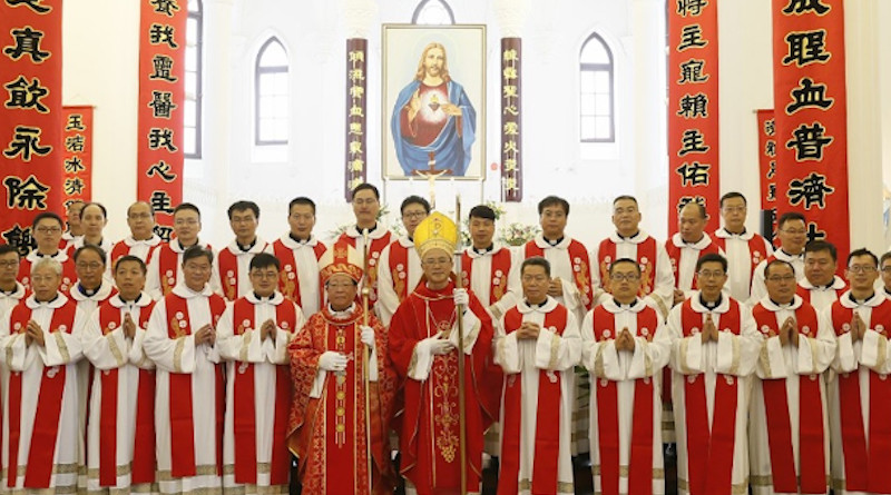 Bishops and priests pose for a photograph after the installation of Bishop Jin Yangke of Ningbo Diocese in Zhejiang province on Aug. 18. (Photo supplied)
