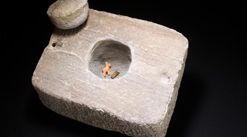 Stone box with carved shell llama and rolled gold foil CREDIT: Teddy Sequin