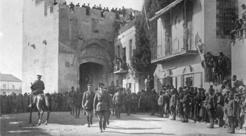 The victorious Edmund Allenby, commander of the Egyptian Expeditionary Force, dismounted, enters Jerusalem on foot out of respect for the Holy City, 11 December 1917. Photo Credit: Copyright, U. & U. (expired), Wikipedia Commons