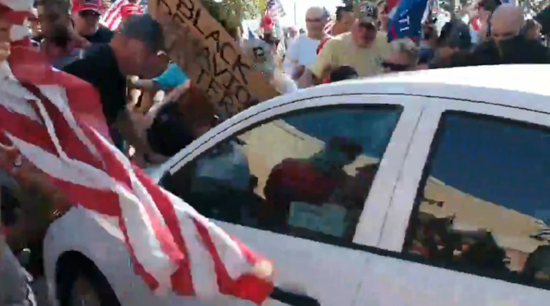 Car ploughs into crowd of pro-Trump counter protesters in California. Photo Credit: Twitter / @desertborder