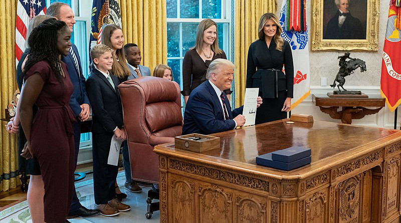 Judge Amy Coney Barrett and her family with US President Donald Trump and First Lady Melania Trump after being nominated for the Supreme Court. Photo Credit: Dan Scavino, the White House