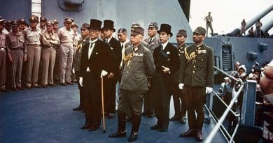 Representatives of the Empire of Japan stand aboard USS Missouri prior to signing of the Instrument of Surrender. Photo Credit: Army Signal Corps, Wikipedia Commons
