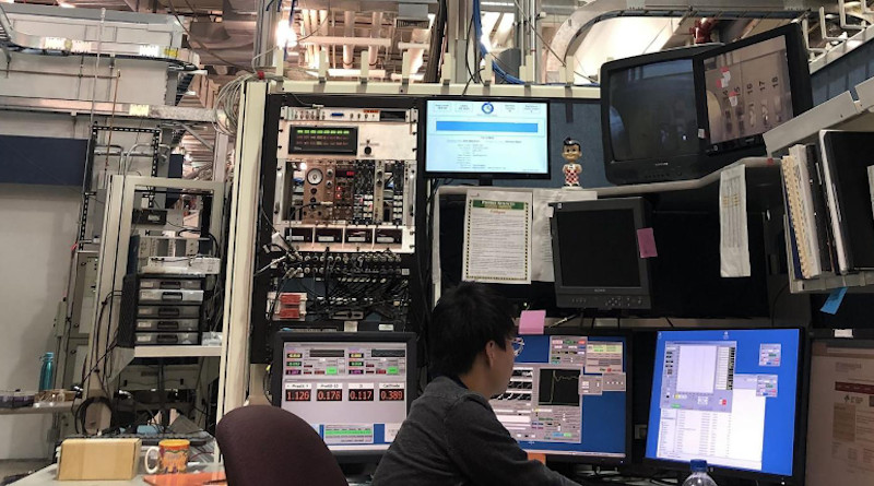 Chemistry graduate student Zhijie Yang is operating synchrotron measurement computer at Advanced Photon Source of the Argonne National Lab in a photo taken before the COVID-19 pandemic. CREDIT: Virginia Tech