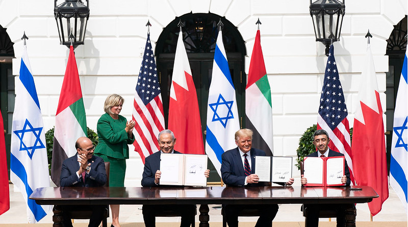 President Donald J. Trump, Minister of Foreign Affairs of Bahrain Dr. Abdullatif bin Rashid Al-Zayani, Israeli Prime Minister Benjamin Netanyahu and Minister of Foreign Affairs for the United Arab Emirates Abdullah bin Zayed Al Nahyan participate in the signing of the Abraham Accords Tuesday, Sept. 15, 2020, on the South Lawn of the White House. (Official White House Photo by Shealah Craighead)
