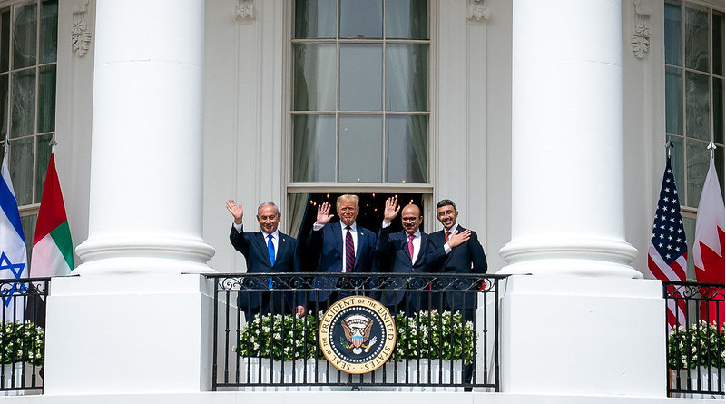 President Donald J. Trump, Minister of Foreign Affairs of Bahrain Dr. Abdullatif bin Rashid Al-Zayani, Israeli Prime Minister Benjamin Netanyahu and Minister of Foreign Affairs for the United Arab Emirates Abdullah bin Zayed Al Nahyanisigns wave from the Blue Room balcony during the Abraham Accords signing Tuesday, Sept. 15, 2020, at the White House. (Official White House Photo by Tia Dufour)