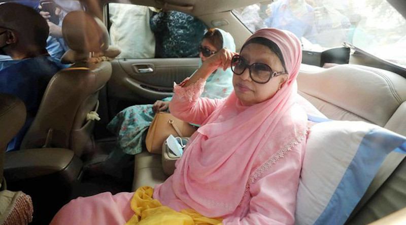 Khaleda Zia (center) and her sister, Selima Islam, wait for a crowd to disperse so they can travel to Zia’s house in the Gulshan section of Dhaka, March 25, 2020. Photo Credit: Benar News