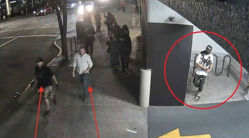 Surveillance footage released by police allegedly shows Michael Reinoehl (circled) as he prepares to follow two Patriot Prayer group members before shooting and killing one of the men. © Portland Police Department