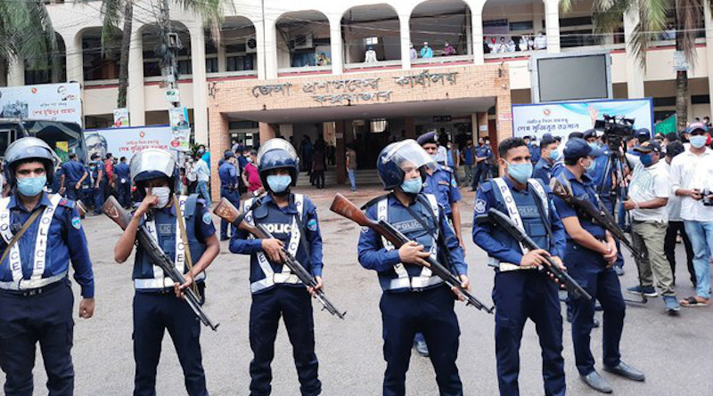 Members of the district police stand guard in front of a court building in Cox’s Bazar district, Bangladesh, Aug. 5, 2020. Photo Credit: BenarNews/Sunil Barua