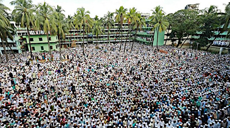 People attend the funeral ceremony of Hefazat-e-Islam leader Ahmed Shafi at the Hathazari madrassa in Chittagong, Bangladesh, Sept. 19, 2020. Photo Credit: Focus Bangla