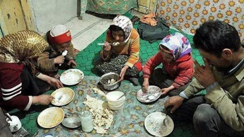 Poor family in Iran eating a meal. Photo Credit: Iran News Wire