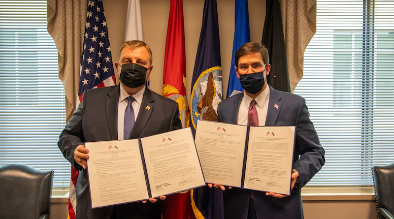 Defense Secretary Dr. Mark T. Esper and the Bulgarian Defense Minister Dr. Krasimir Karakachanov, hold copies of the signed 10-year road map charting defense cooperation agreement at the Pentagon, Washington D.C., Oct. 6, 2020. Photo Credit: Air Force Staff Sgt. Jack Sanders, DOD