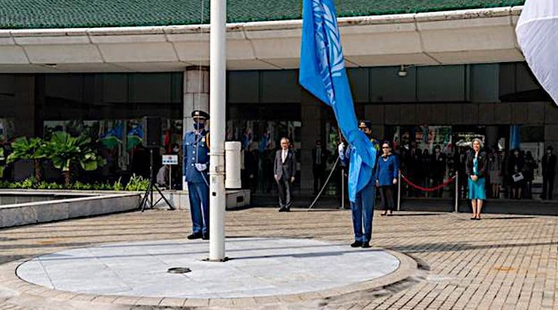 Raising United Nations flag. Photo credit: ESCAP/Suwat Chancharoensuk