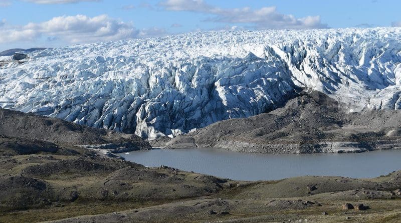 A newly forming lake at the edge of the Greenland ice sheet, exposing sediments released by the ice. Such lake beds are becoming common as the ice recedes. CREDIT: Kevin Krajick/Earth Institute