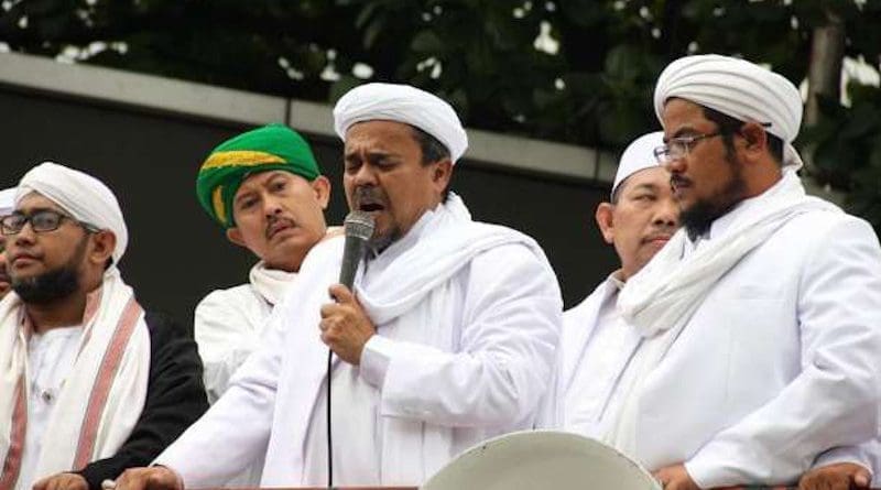 Muhammad Rizieq Syihab (with microphone) is seen at a protest in Jakarta in October 2106. Syihab returned to Indonesia on Nov. 10 after more than three years living in exile in Saudi Arabia. (Photo: Ryan Dagur/UCA News)