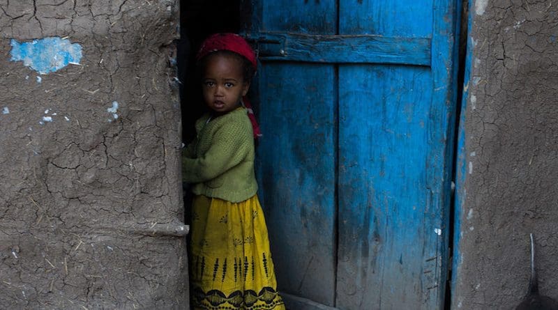A girl stands outside her home in the Tigray Region, Ethiopia. Credit: UNICEF/Tanya Bindra