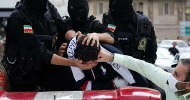 Iranian security forces detain a protestor. Photo Credit: Iran News Wire