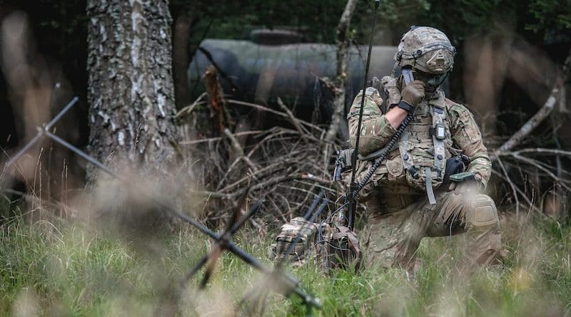 A soldier conducts a radio check with the tactical operations center during Exercise Saber Junction 2019 in Hohenfels Training Area, Germany, Sept. 22, 2019. Photo Credit: Army Sgt. Henry Villarama