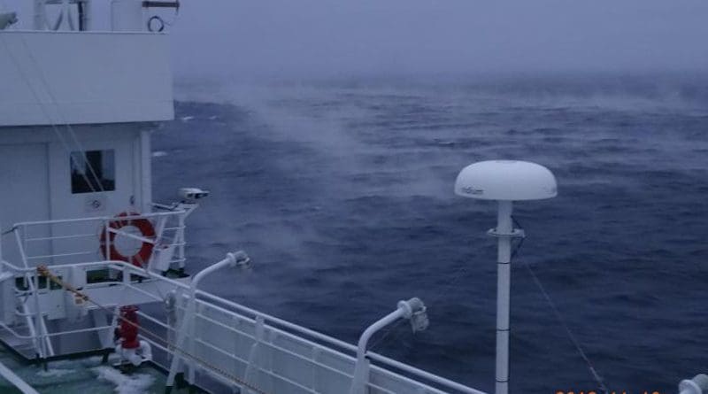 Researchers aboard the research vessel Mirai watched water vapor rise from the Chukchi Sea, resembling the mist that rises from a hot bath in a cold room. The Pacific Ocean brings relatively warm 2-degree Celsius water into the Arctic Ocean, where much colder minus 10-degree Celsius winds blow across the surface. New analysis by researchers in Japan shows how changes in the atmosphere that raise Pacific sea surface temperatures during the summer can delay the formation of Arctic sea ice months later. CREDIT: Photo by Jun Inoue, National Institute of Polar Research, CC BY-SA.