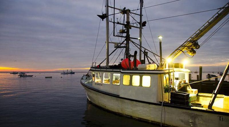A fishing vessel preparing to fish at sunrise. CREDIT NOAA Fisheries