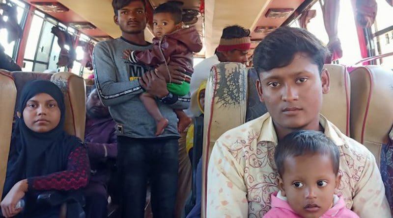 Rohingya refugees sit on a bus as they wait to leave Cox’s Bazar district for Chittagong, en route to Bhashan Char Island, Bangladesh, Dec. 28, 2020. [Abdur Rahman/BenarNews]