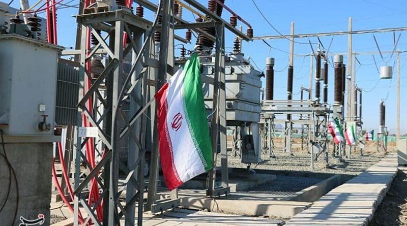 Iran flag and electricity power stations. Photo Credit: Tasnim News Agency