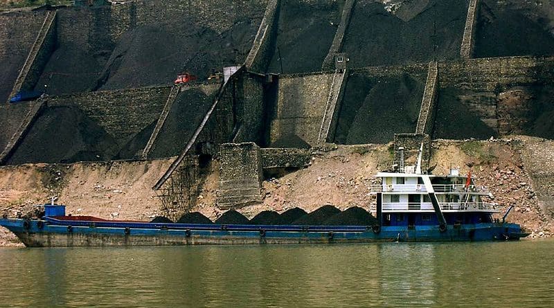 A coal shipment underway in China. Photo Credit: Rob Loftis, Wikipedia Commons