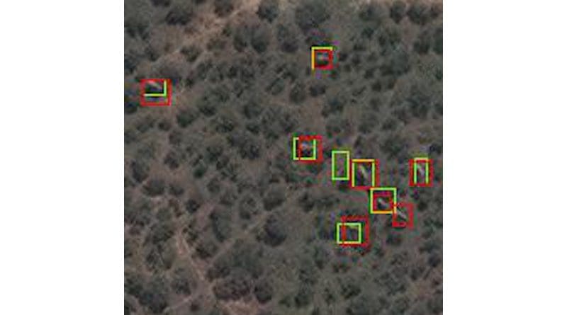 Elephants in woodland as seen from space. Green rectangles show elephants detected by the algorithm, red rectangles show elephants verified by humans. CREDIT Satellite image (c) 2020 Maxar Technologies