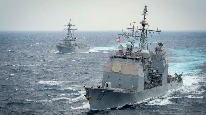 The Ticonderoga-class guided-missile cruiser USS Bunker Hill (CG 52), front, and the Arleigh Burke-class guided-missile destroyer USS John Finn (DDG 113) in South China Sea. Photo Credit: Petty Officer 3rd Class Dartanon Delagarza