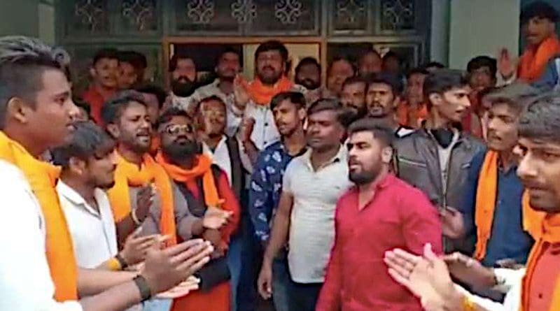 Right-wing Hindu activists shout slogans inside Satprakashan Sanchar Kendra in Indore city on Jan. 26 after accusing the Catholic media center of engaging in illegal religious conversion. (Photo: UCA News)