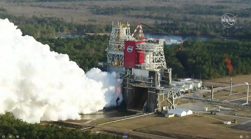 The core stage for the first flight of NASA's Space Launch System rocket is seen in the B-2 Test Stand during a hot fire test Jan. 16, 2021, at NASA's Stennis Space Center near Bay St. Louis, Mississippi. Credits: NASA Television