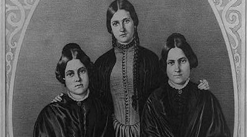The Fox sisters: Kate (1838-92), Leah (1814-90) and Margaret (or Maggie) (1836-93). Lithograph after a daguerreotype by Appleby. Published by N. Currier, New York. In 1848, two sisters from upstate New York, Maggie and Kate Fox, reported hearing 'rappings' and 'knocks' that they interpreted as communication coming from a spirit in their house. These events and these sisters would eventually be considered the originators of Spiritualism. CREDIT N. Currier, New York