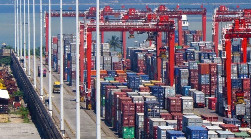 Containers stacked at Sri Lanka's Colombo port. Photo Credit: Rehman Abubakr, Wikipedia Commons