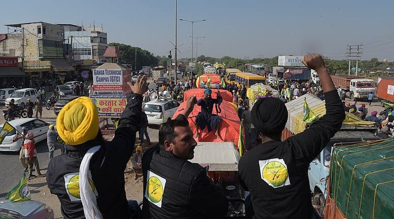 Farmers protest in India. Photo Credit: Randeep Maddoke; randeepphotoartist@gmail.com, Wikipedia Commons