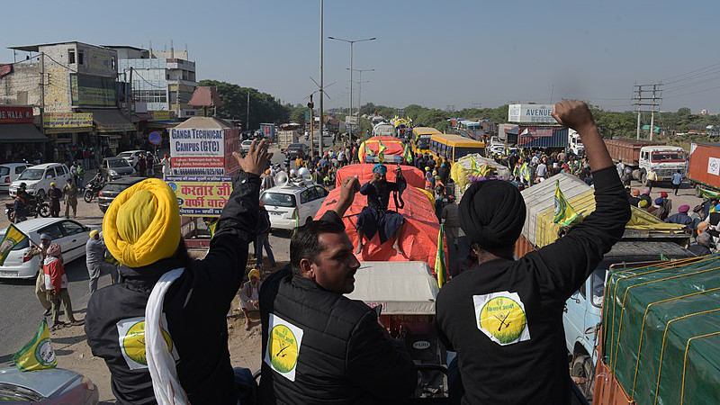 Farmers protest in India. Photo Credit: Randeep Maddoke; randeepphotoartist@gmail.com, Wikipedia Commons