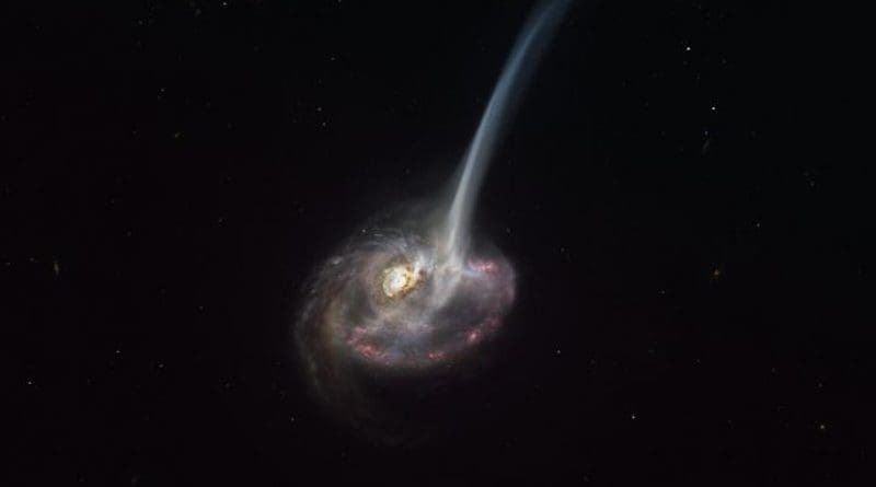 This artist's impression of ID2299 shows the galaxy, the product of a galactic collision, and some of its gas being ejected by a "tidal tail" as a result of the merger. New observations made with ALMA, in which ESO is a partner, have captured the earliest stages of this ejection, before the gas reached the very large scales depicted in this artist's impression. CREDIT ESO/M. Kornmesser