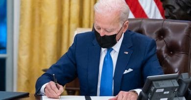 File photo of President Joe Biden signing an executive order. Photo Credit: Official White House Photo by Adam Schultz