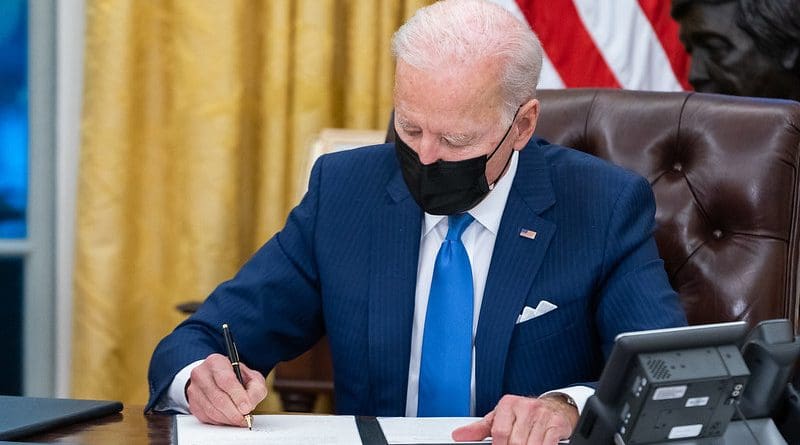 File photo of President Joe Biden signing an executive order. Photo Credit: Official White House Photo by Adam Schultz