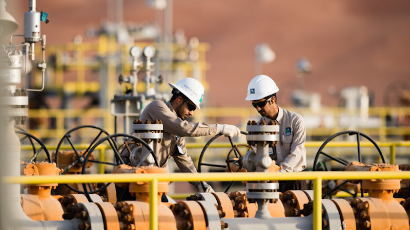 Workers at a Saudi Aramco oil installation. Photo Credit: Saudi Aramco