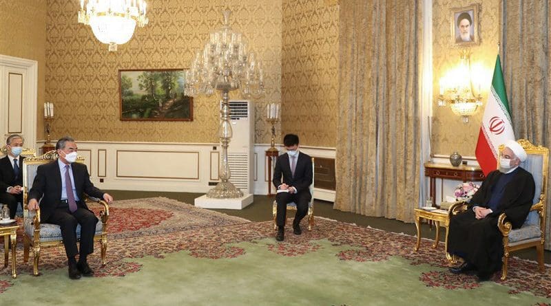 China's Foreign Minister Wang Yi meet with Iran's President Hassan Rouhani in Tehran. Photo Credit: Tasnim News Agency