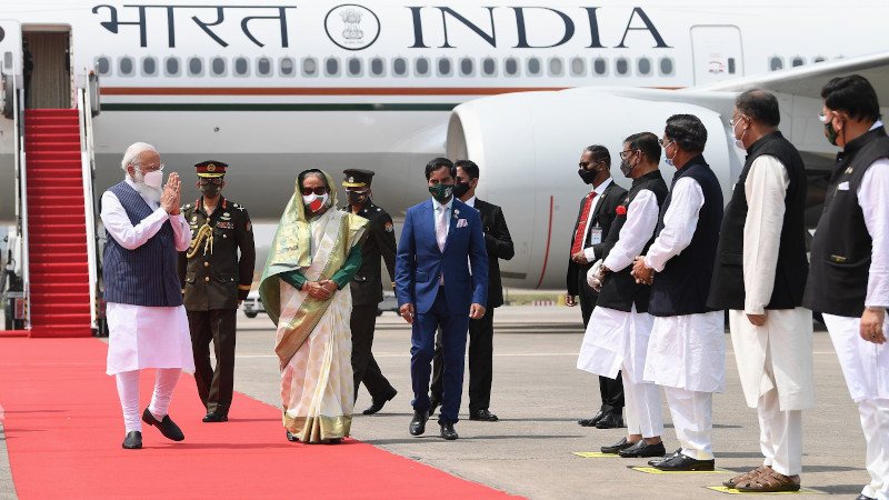 India's Prime Minister, Shri Narendra Modi being received by the Prime Minister of Bangladesh, Ms. Sheikh Hasina, on his arrival at Hazrat Shahjalal International Airport, in Dhaka, Bangladesh. Photo Credit: PM India