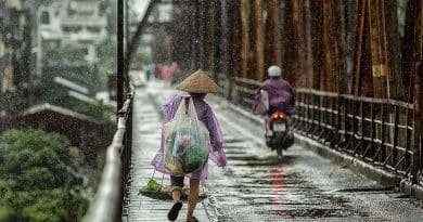 Monsoon season Bridge Wet People Street Woman Asia