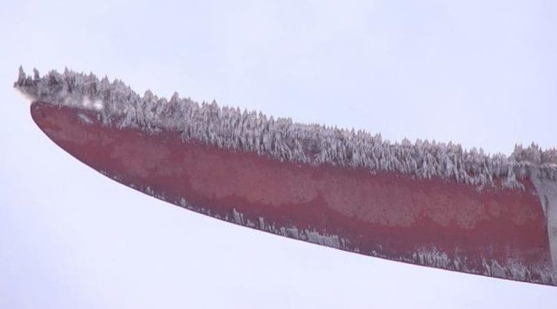 This drone photo from a field study of icing on wind turbines shows how ice accumulated at the tip of a turbine blade during a winter storm. CREDIT Photo courtesy of Hui Hu/Iowa State University