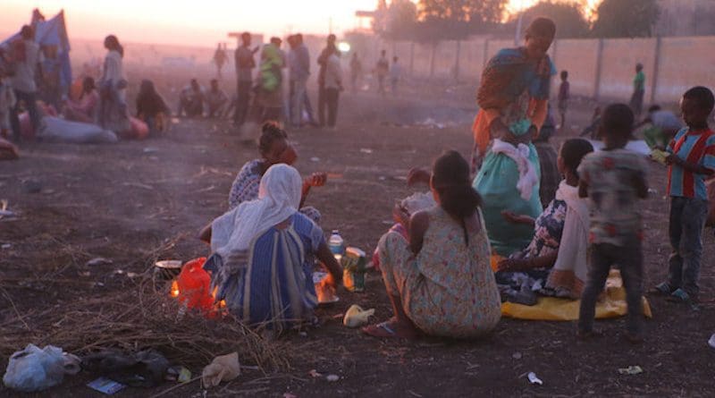 Ethiopian refugees fleeing clashes in the country's northern Tigray region, rest and cook meals near UNHCR's Hamdayet reception centre after crossing into Sudan. Credit: © UNHCR/Hazim Elhag