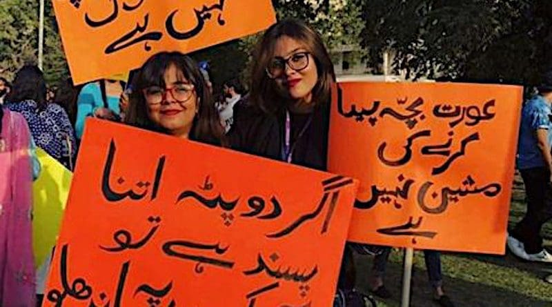 Women displaying placards during Aurat March in Pakistan. Photo Credit: Nawab Afridi, Wikipedia Commons