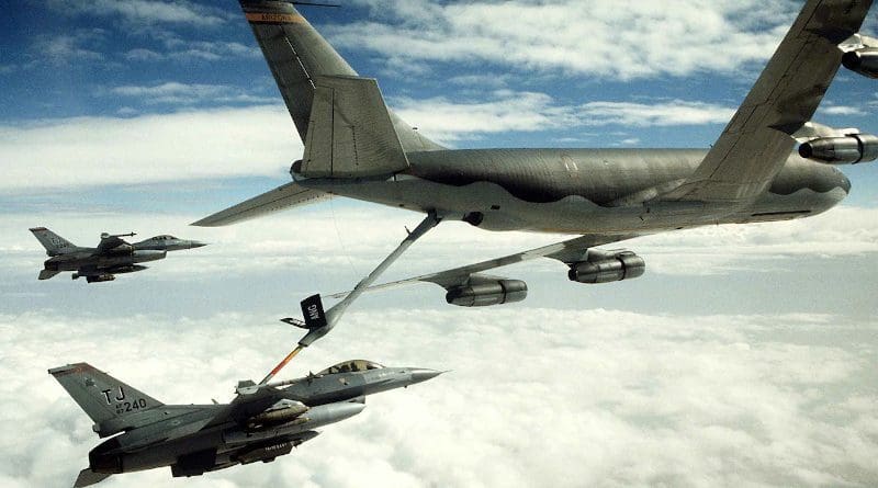 An Air Force 401st Tactical Fighter Wing F-16C Fighting Falcon aircraft refuels from a KC-135 Stratotanker aircraft as another F-16 stands by during Operation Desert Storm, Feb. 1, 1991. Photo Credit: US Air Force