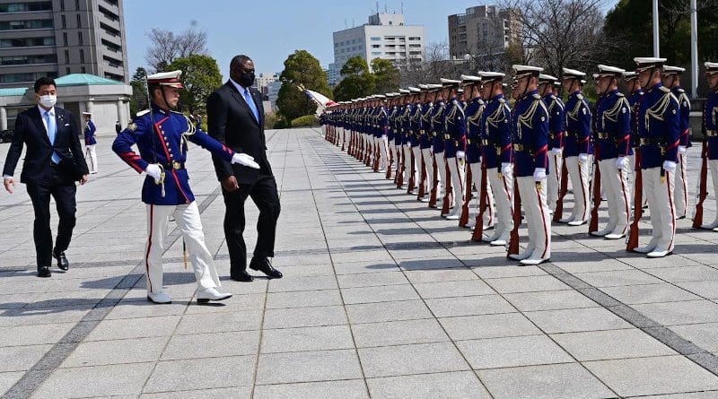Secretary of Defense Lloyd J. Austin III troops the line during a welcome ceremony for him at the Japanese Ministry of Defense in Tokyo, March 16, 2021. Photo Credit: Jim Garamone, DOD