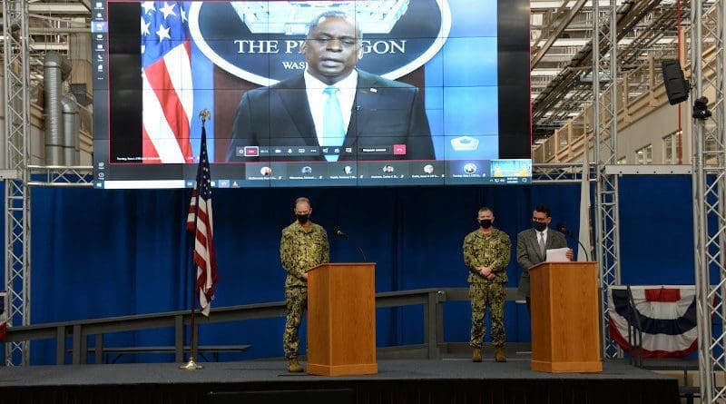 Naval Information Warfare Systems Command’s leadership triad from left, Navy Rear Adm. Douglas Small, commander, Command Master Chief Thor Forseth and Executive Director John Pope listen to a video message from Secretary of Defense Lloyd J. Austin III during a Defense Department-mandated extremism stand down presented virtually from NAVWAR’s Old Town San Diego complex, March 8, 2021. Photo Credit: Rick Naystatt, Navy