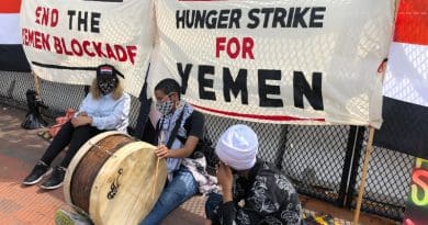Iman Saleh (with drum) on hunger strike in Washington D.C. to protest the blockade and war against Yemen; seated next to her is Rep. Ilhan Omar. Photo Credit: Code Pink